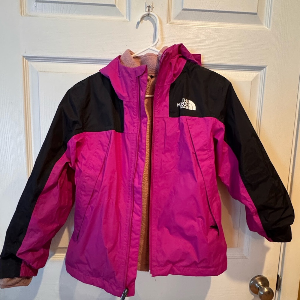 Northface jacket, pretty magenta color.  Didn’t even get worn one season!